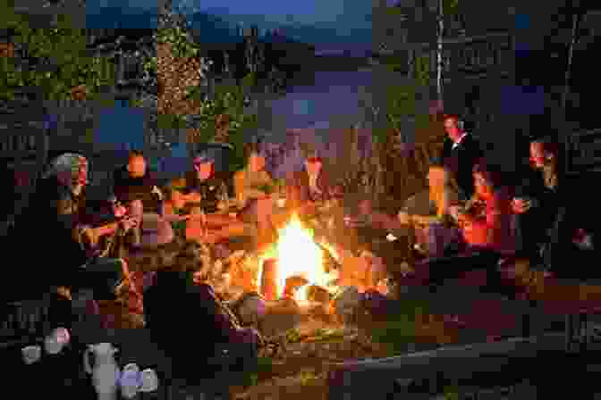 A Group Of People Sitting Around A Campfire Transcendence: How Humans Evolved Through Fire Language Beauty And Time