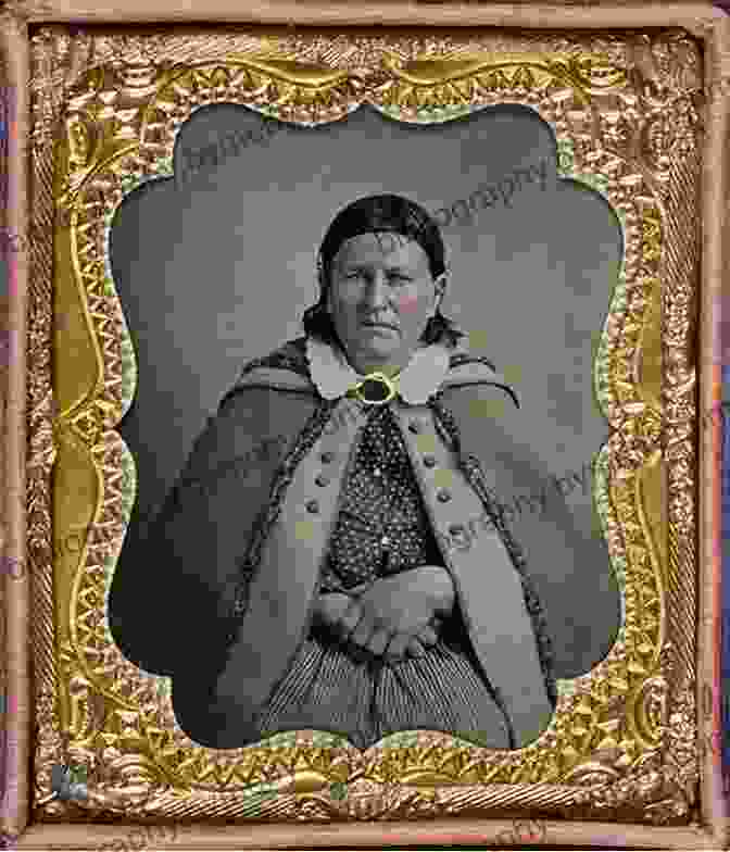 A Portrait Of Cynthia Ann Parker, A Young Woman With Long, Dark Hair And Piercing Blue Eyes. She Is Wearing A Traditional Comanche Dress And Holding A Pipe. Cynthia Ann Parker: The Story Of Her Capture At The Massacre Of The Inmates Of Parker S Fort Of Her Quarter Of A Century Spent Among The Comanches ILLUSTRATED