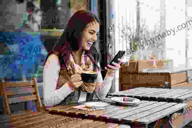 A Woman Smiling And Holding A Cup Of Coffee While Working On Her Laptop Don T Force It Solve It : How To Design Meaningful And Efficient Design Processes