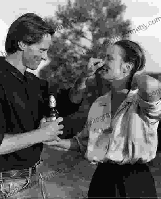 Black And White Photo Of A Young Sam Shepard Standing In Front Of His Childhood Home In California Conversations With Sam Shepard (Literary Conversations Series)