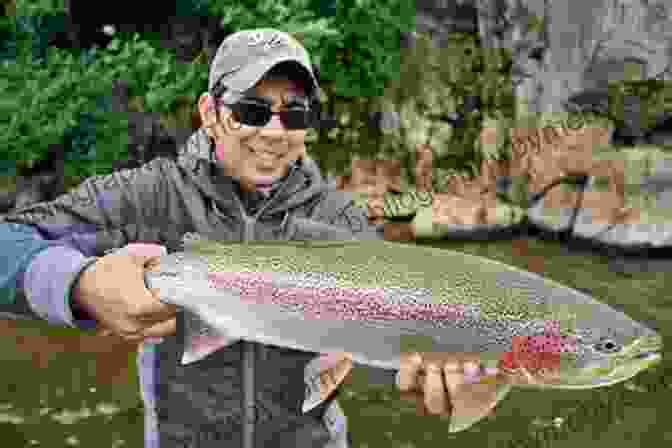 Fisherman Holding A Large Rainbow Trout Up For Display Sidetracks: 40 True Stories Of Hunting And Fishing On Paths Less Traveled (The Sidetracks Series)