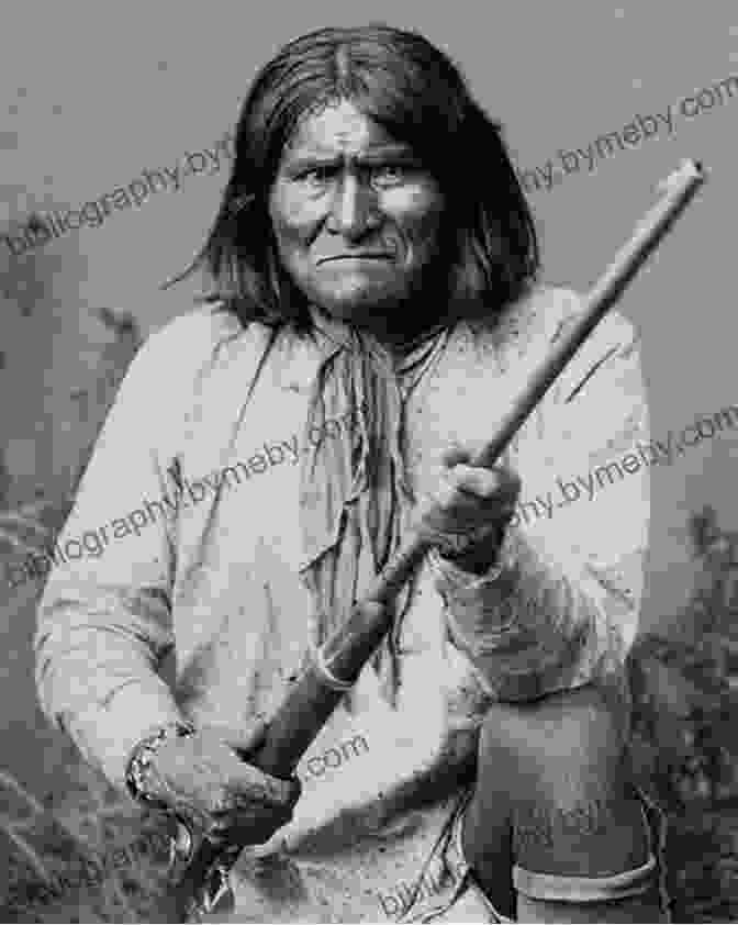 Geronimo, The Legendary Apache Leader, Stands Defiantly On A Rock. Geronimo: The True Story Of America S Most Ferocious Warrior