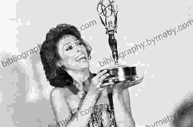 Rita Moreno Holding Her EGOT Awards, Smiling And Looking Stolz Rita Moreno: A Memoir Rita Moreno