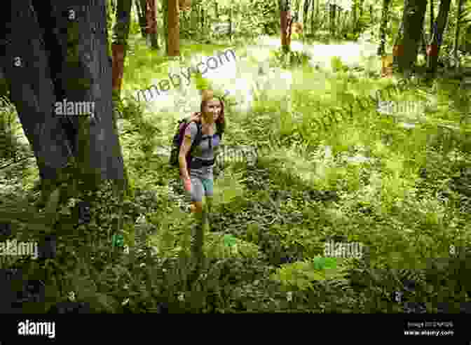 Woman Trekking Through A Lush Green Forest Way Out There: Adventures Of A Wilderness Trekker